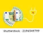 Euros banknotes on a yellow background. Energy crisis and expensive electricity, gas price. Big heating, gas and electricity bill