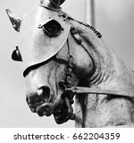 Small photo of Black and white study close up of Joan of Arc war horse statue abstract power New Orleans