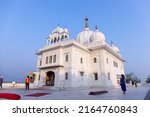 Small photo of Anandpur Sahib, Punjab, India - March 2022: Gurdwara Takht Sri Kesgarh Sahib in anandpur sahib, the birthplace of the khalsa sacred to the Sikh religion. White building architecture of sikhism.