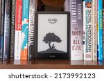 Small photo of 1 July 2022 - Calgary, Alberta Canada - Amazon kindle tablet for reading books.