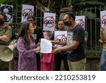 Small photo of Kuala Lumpur, Malaysia - 10052022: Youth NGO Gagasan Belia representative Tharma Pillai handed over a memorandum to Segambut MP Hannah Yeoh during the GEG protest in front of the Parliament.