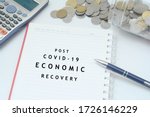 Post covid-19 economic recovery conceptual. Top view of an image with 'POST COVID-19 ECONOMIC RECOVERY