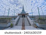 Small photo of Kyauksein Pagoda, also known as the Jade Pagoda, stands resplendent in Amarapura, Mandalay, adorned with intricate jade decorations under a dramatic sky