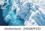 Small photo of An aerial perspective showcases the dramatic melting icebergs of Antarctica, where the vivid blue sea claims the collapsing icy giants, a poignant visual testament to climate change