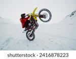 Small photo of Winter motocross. Racers ride on ice. Winter sports.