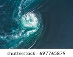 Whirlpools of the maelstrom of Saltstraumen, Nordland, Norway. Saltstraumen is a small strait with one of the strongest tidal currents in the world. By Letowa.