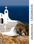 Small photo of Greek church with sea view