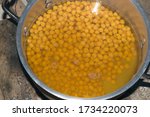 Fresh boiled chick peas in water in a bowl, ready to eat.Chick peas are called choalay and channa in local language of Pakistan and India.