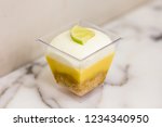 Lemon Mousse In Cup On White...