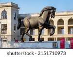 Small photo of Milan, Italy - March 28, 2022: Leonardo's Horse (Cavallo di Leonardo) is a bronze statue by Nina Akamu, made in 1999 after the work of Leonardo da Vinci, exposed at the San Siro racetrack.