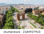 Small photo of Aerial view of Barcelona Urban Skyline and The Arc de Triomf or Arco de Triunfo in spanish, a triumphal arch in the city of Barcelona. Sunny day.