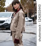 Small photo of PARIS, France- October 2 2018: Kristi Gogsadze on the street during the Paris Fashion Week.