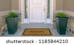 Front Door With Doormat Plants...