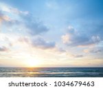 blue sky with clouds and sea, sunset
