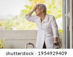 Small photo of Exhausted senior woman has headache dizziness from the sizzling summer temperatures,old elderly suffering from hot summer weather,symptoms of heat stroke,high temperature on a sunny day,feeling faint