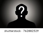 silhouette male on gradient background with white question mark