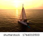Sunset On Sailing Catamaran At...