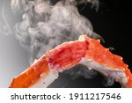 A scene where steam rises from a boiled king crab