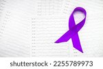 Small photo of International Epilepsy Day, Epilepsy awareness. Purple ribbon on brain wave on electroencephalogram EEG for epilepsy