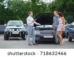 Buying used car. Car Dealer Inventory. Used cars store. Male wants to buy the car. Happy life. Summer time. Young family. Communication with the seller from auto for sale.