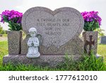 A Gravestone And Epitaph For A...
