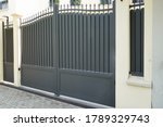 steel grey gate aluminum portal of suburb home