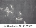 Small photo of gray concrete wall background plaster roughcast dirty grey facade marked with white stains