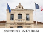 Small photo of French tricolor and europa flag on mairie liberte egalite fraternite text building mean city hall freedom equality fraternity in town center of biganos in france