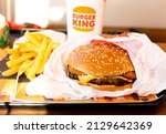 Small photo of Amsterdam, Netherlands - 25 Feb 2022 : Burger set from burger king restaurant. Burger King's franchisee is cutting portion size and ending some discount amid soaring inflation.