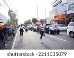 Small photo of Marathon race in Magelang Indonesia, people set foot on city roads a distance of 5 and 10 kilometers. In the provision of funny gimmick to make it fun. : MAGELANG, Indonesia 18 september 2022
