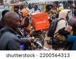 Small photo of A jumia delivery dispatch spotted in traffic in Lagos, NIGERIA, on September 1, 2022. Daily life in Lagos, Nigeria’s largest city, despite the rapidly increasing cost of living