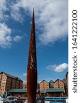 Small photo of Gloucester, United Kingdom - September 08 2019: The 22 Metre high beacon steel sculpture by Wolfgang Butress in Gloucester Docks