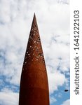 Small photo of Gloucester, United Kingdom - September 08 2019: The top of the 22 Metre high beacon steel sculpture by Wolfgang Butress in Gloucester Docks