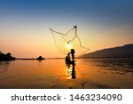 Asia Fisherman Net Using On...