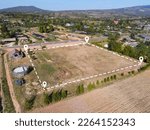 Small photo of Land plot for building house aerial view, land field with pins, pin location for housing subdivision residential development owned sale rent buy or investment home or house expand the city suburb