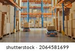 Small photo of Future Technology 3D Concept: Automated Modern Retail Warehouse AGV Robots Transporting Cardboard Boxes in Distribution Logistics Center. Automated Guided Vehicles Delivering Goods, Products, Packages