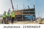 Small photo of Real Estate Project Construction Site with Architectural Engineer, Investor and Worker Completing Building Development by Using 3D VFX Graphics. Futuristic Concept of Buildings Development