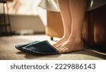 Small photo of Person Waking Up and Stepping into Cozy Slippers. Ready to go about Business, on a Grand Sunny Day. Seize the Day. Low Angle Side View Ground Shot