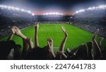 Small photo of Establishing Shot of Fans Cheer for Their Favorite Team on a Stadium During Soccer Championship Final Match. Teams Play, Crowd of Fans Celebrate Victory and Goal. Football Cup Tournament.