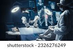 Small photo of Surgeon Wearing AR Headsets And Using High-Precision Remote Controlled Robot Arms To Operate On Patient In Hospital. Doctor Controlling Robotic Limbs, Observing Organs On Holographic VFX Displays.