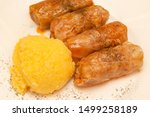 Small photo of Stuffed cabbage rolls with polenta ball