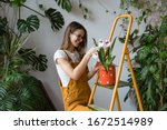 Young Smiling Woman Gardener In ...