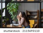 Bored unmotivated female worker sit at office desk with laptop tired of looking for problem solution, businesswoman need inspiration to make monotonous work or uninteresting task. Lack of motivation