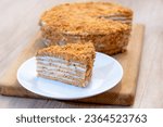 Honey cake. classic honey cake . Slit and Slice of Cake. Homemade baking concept