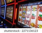 Slot machine or commonly called a one arm bandit is a gambling machine that creates a game of chance for its customers.