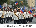 Small photo of Participants march up Madison Avenue in New York City during the annual Philippine Independence Day Parade on June 4, 2023.