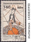 Small photo of CZECHOSLOVAKIA - CIRCA 1968: A stamp printed by Czechoslovakia, shows Friendly caricature Charlie Chaplin funambulist. World Culture Personalities - UNESCO, circa 1968