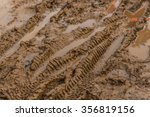 Texture Of Wet Brown Mud With...