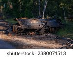 Small photo of burned russian armed vehicle.Ukrainian counteroffensive operation. The defenders of Ukraine stop the russian army. Ukraine armed forces defending and regaining occupied territory