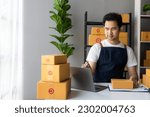 Small photo of Online digital business is a new start-up small business nowadays for young Asian online shops stay at home delivering to customers. The concept of SME entrepreneurs sending parcels
